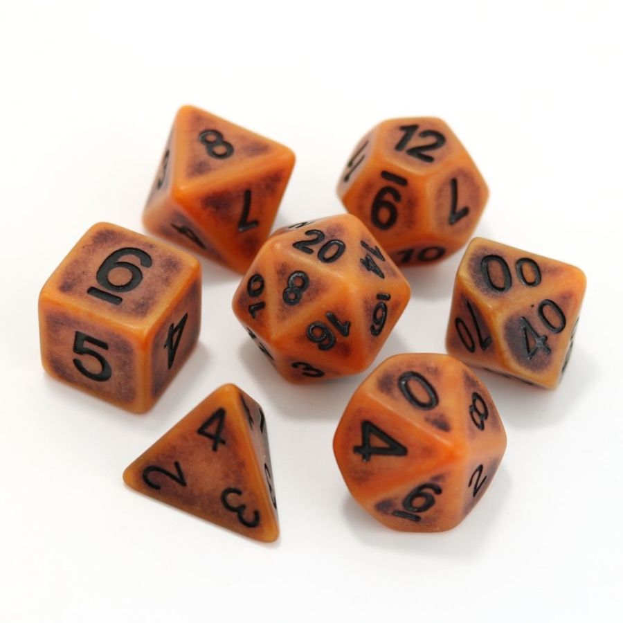 7CT PUMPKIN GOLEM POLY DICE SET - ORANGE AND BLACK